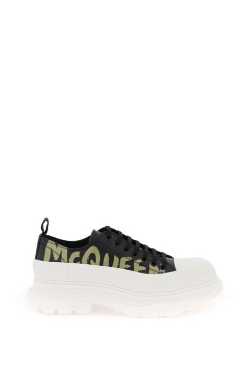 tread slick sneakers with graffiti logo