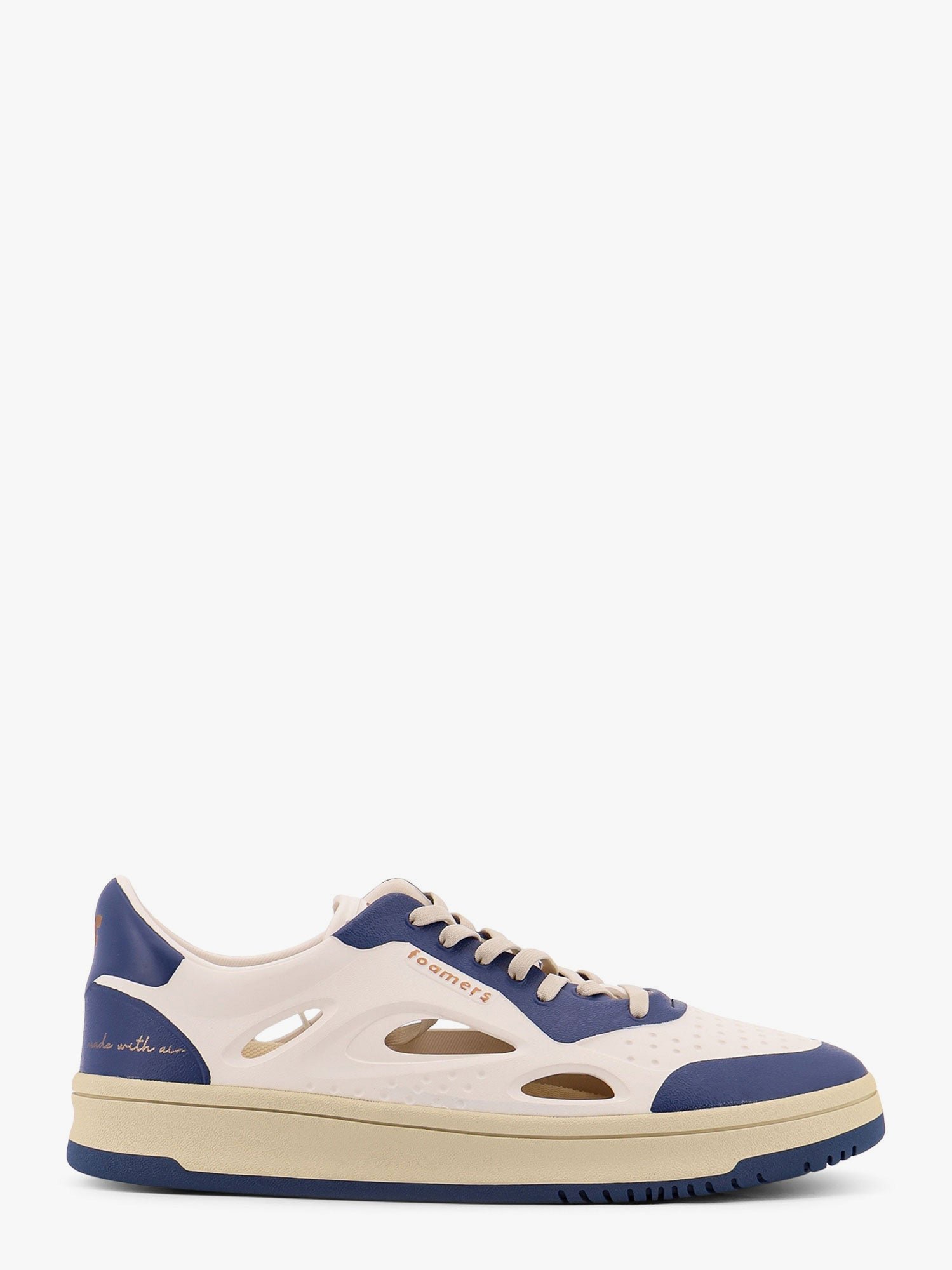 Low-top foam sneakers with lateral openwork