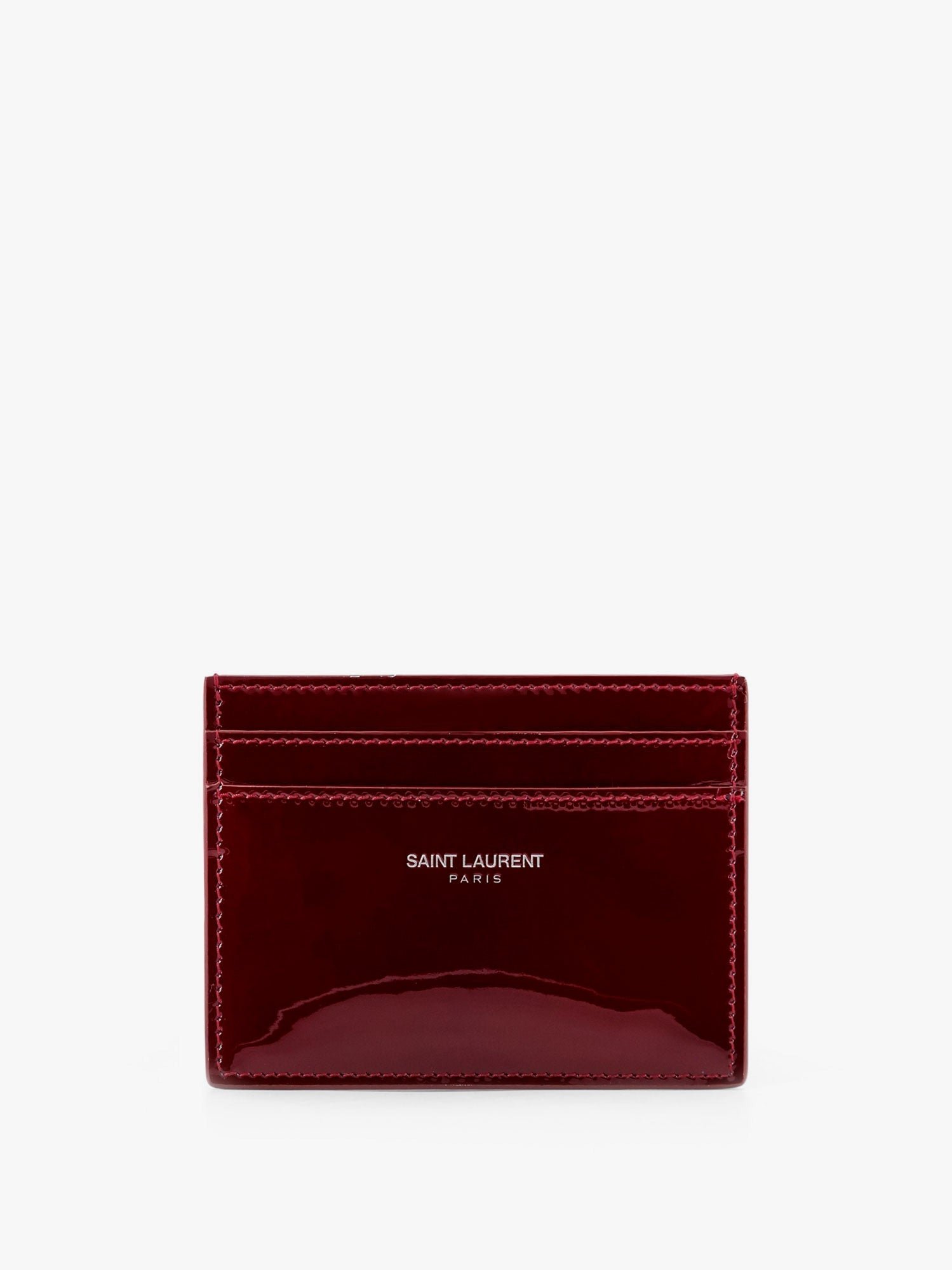 Patent leather card holder with engraved ogo on the front