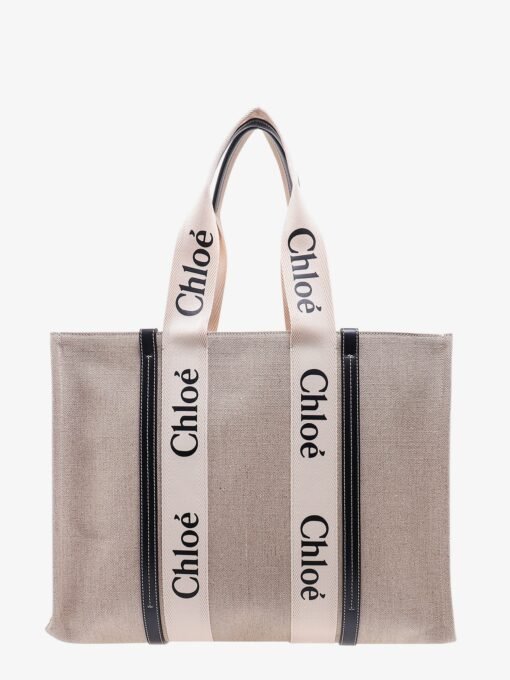 Linen shoulder bag with logo print. this bag is made with lower environmental impact material