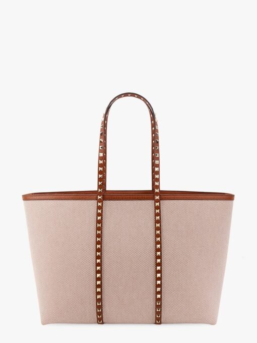 Canvas and leather shoulder bag with iconic studs
